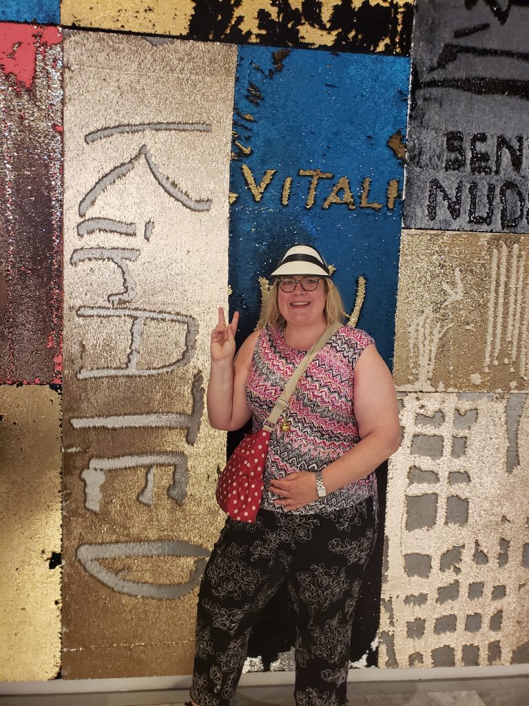 Kirsten Voege Marketing Consultant KIRated Communications at the sequin wall, aka "I Was Here," by Lara Schnitger at Hudson Yards in NYC. photo credit: #theINTERN aka kFlo