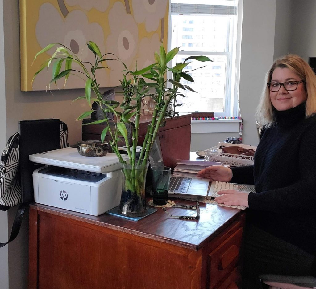Kirsten Voege Marketing Consultant & Entrepreneur at her work from home desk doing some Professional Development during Covid-19